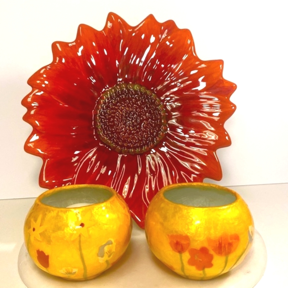 A Blooming red sunflower decorative plate and two vintage candle holders